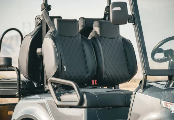 Front black bucket seats with armrests and quilted pattern in EPIC e40 golf cart