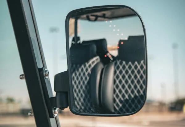 Side mirror and headrest view of EPIC e40L electric golf cart highlighting premium upholstery