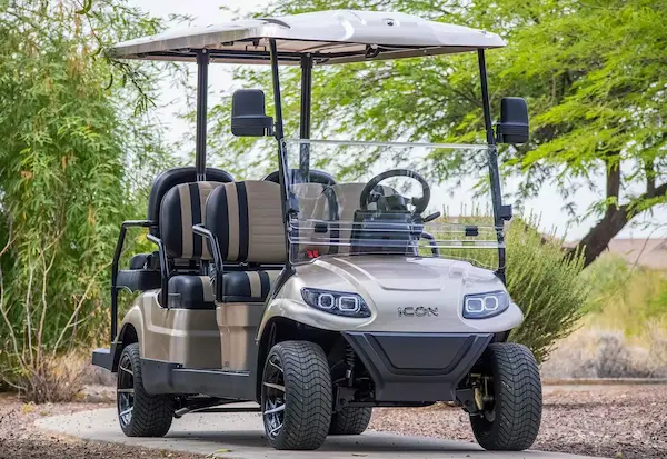ICON i60 6-passenger golf cart in champagne color with black accents, street-legal and ready for group transport in Florida